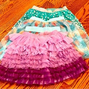 SET OF 4 girls’ fancy skirts. Sizes 5-7. Perfect condition.